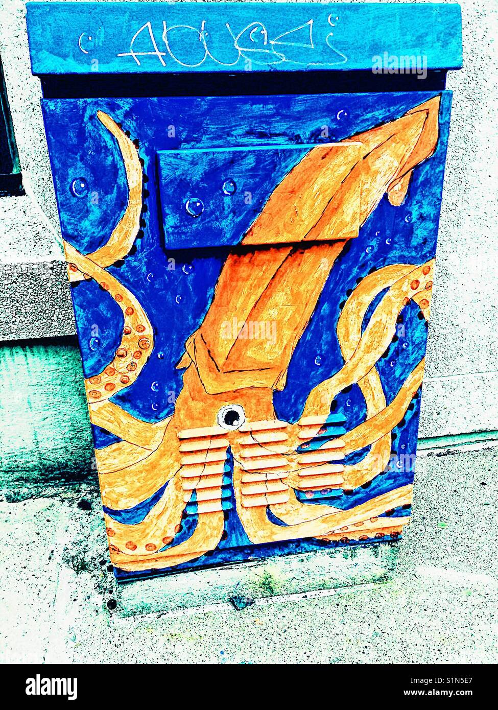 Brightly coloured Octopus painted on electricity box, Canada Stock Photo