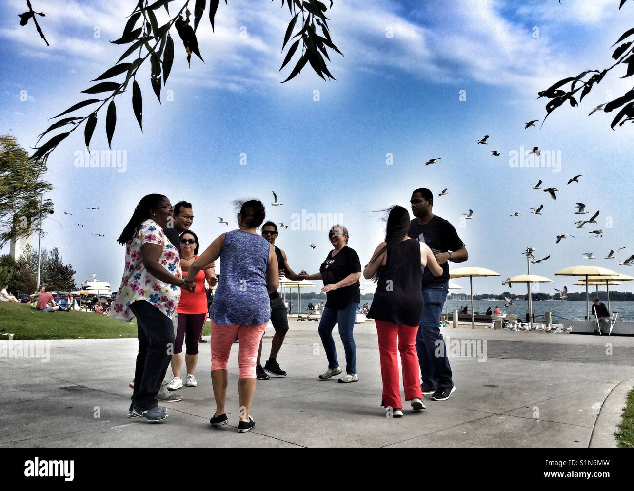 People dancing at HTO Park in Toronto. - Smartphone Captured Stock Image