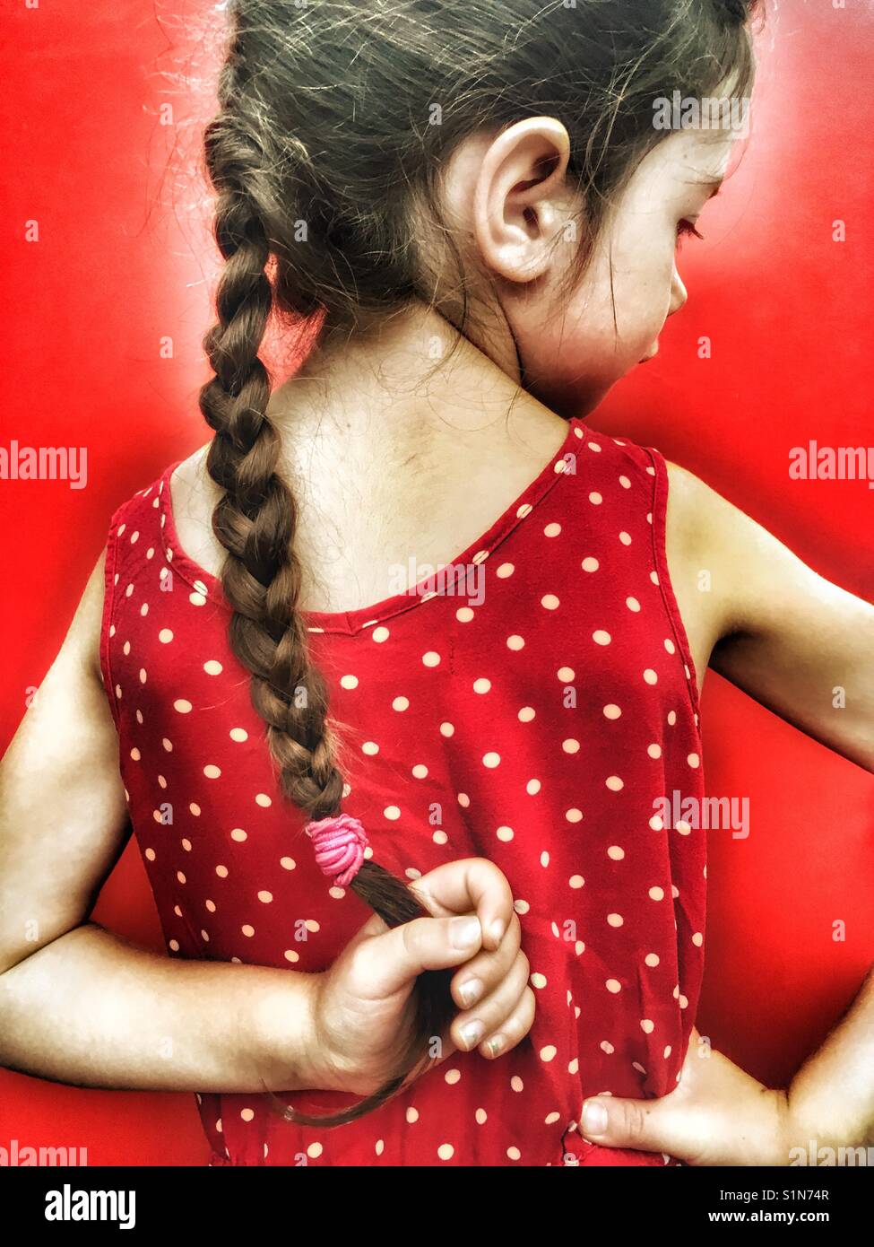 Girl with long platted hair - Smartphone Captured Stock Image