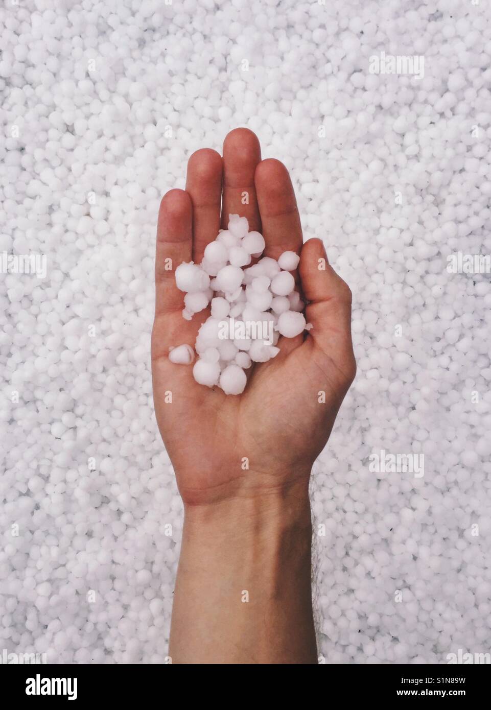 Hail Storm in Hand Stock Photo