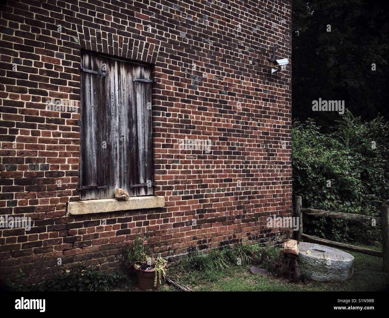 Brick wall shuttered window Kerr Mill at Sloan Park Millbridge North Carolina - Smartphone Captured Stock Image