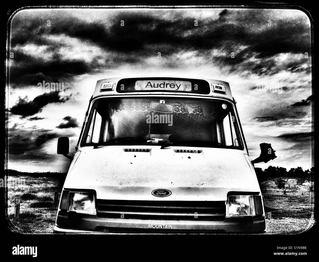 Former NHS hospital transport vehicle now used as a motorhome - Smartphone Captured Stock Image