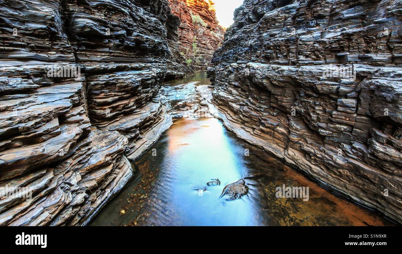 River running through high rocky gorge - Smartphone Captured Stock Image