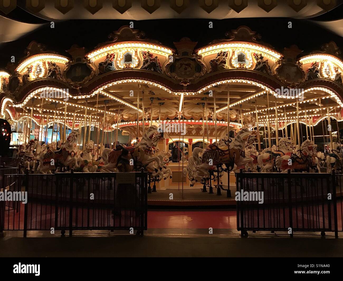 Wooden horse merry-go-round at Tokyo Disneyland, Tokyo, Japan. Stock Photo