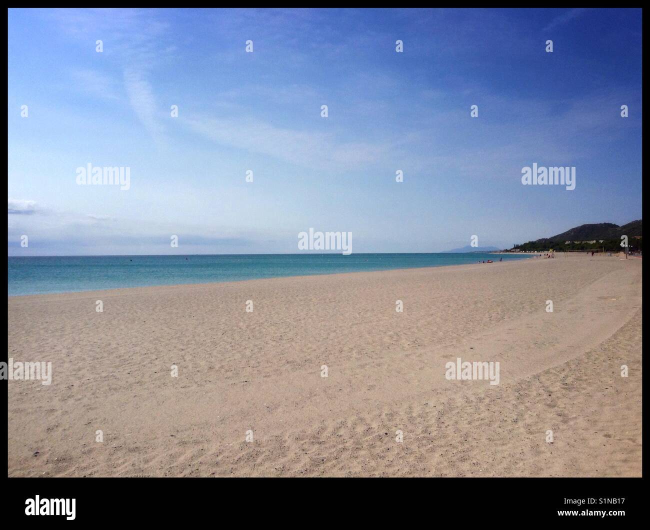 The beach and sea at L'Hospitalet de l'Infant, Catalonia, Spain. - Smartphone Captured Stock Image