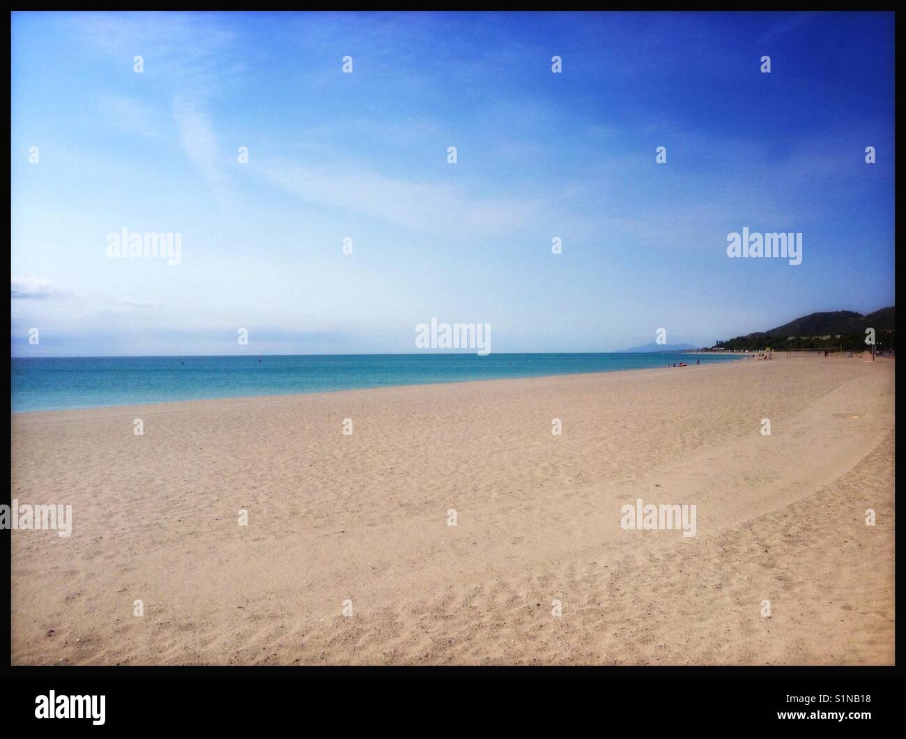The beach and sea at L'Hospitalet de l'Infant, Catalonia, Spain. - Smartphone Captured Stock Image