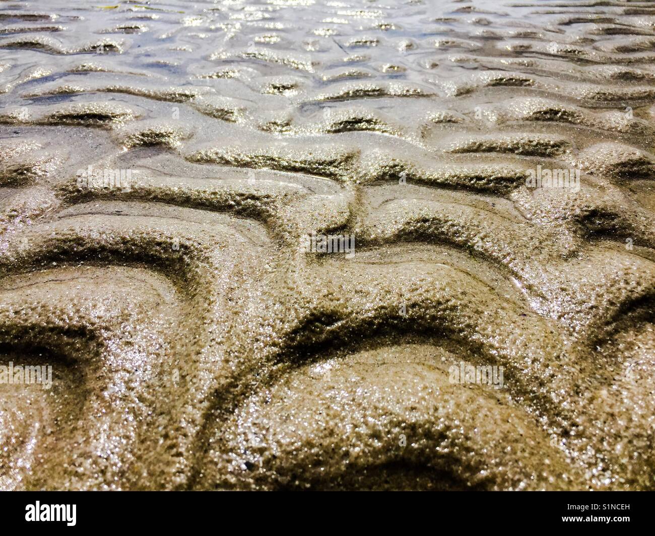 Sandy Ripple Sand and water pattern hi-res stock photography and images - Alamy