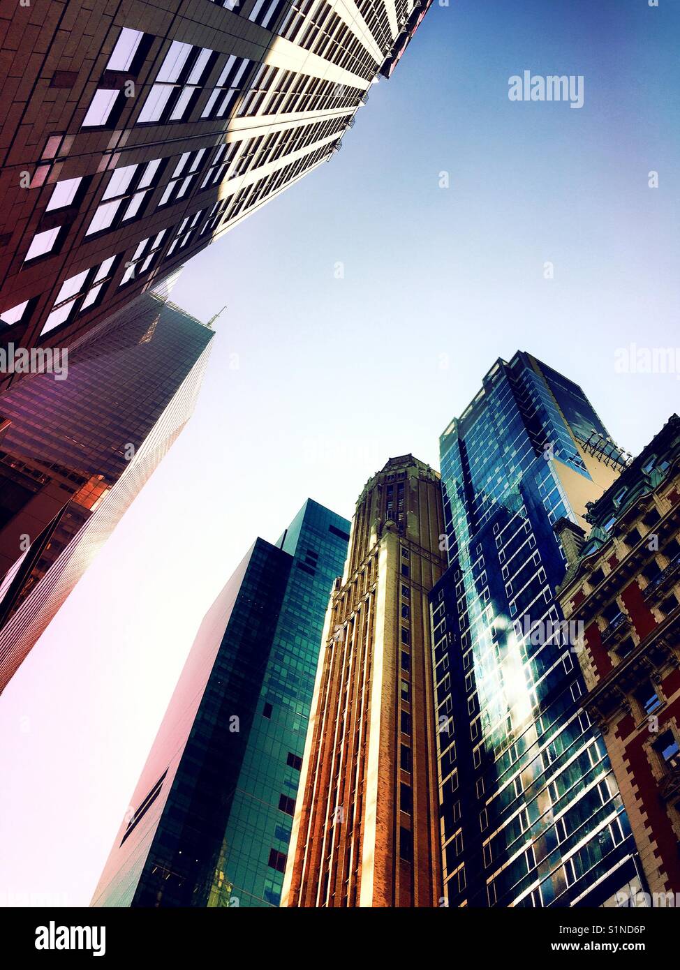 Skyscrapers as seen from sidewalk view, New York City, USA - Smartphone Captured Stock Image