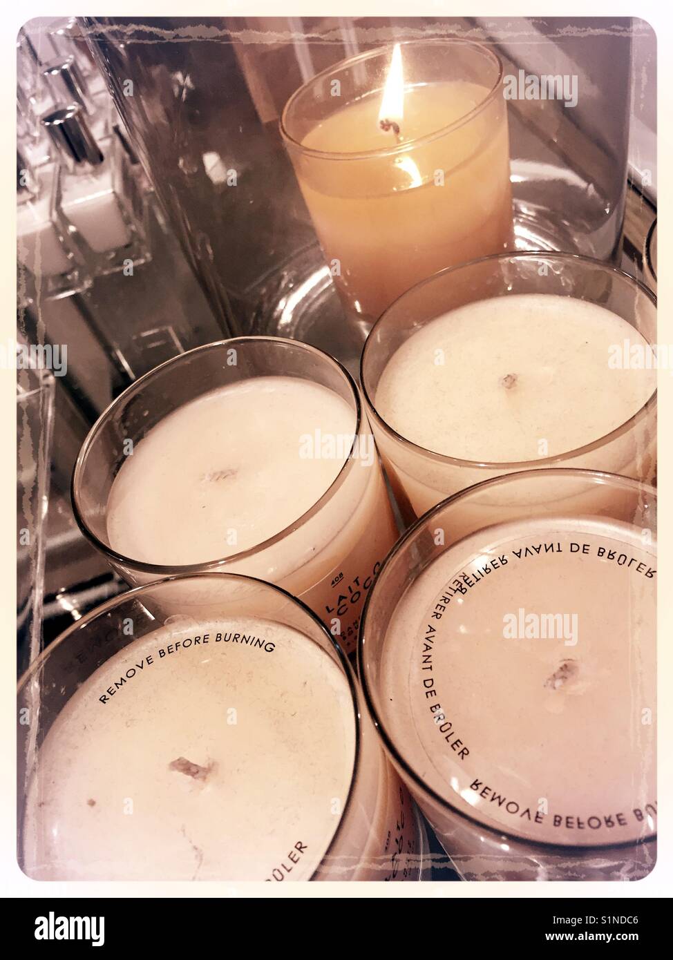 Votive candle display at retail store, USA - Smartphone Captured Stock Image