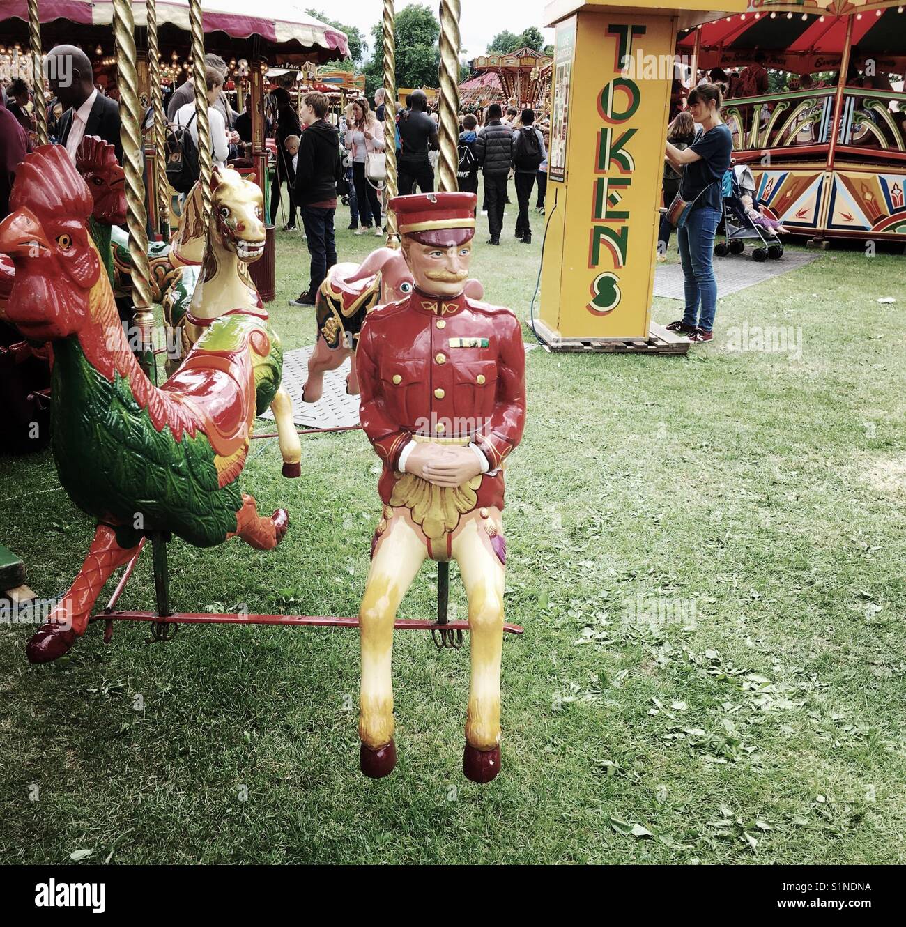 Character on carousel Stock Photo - Alamy