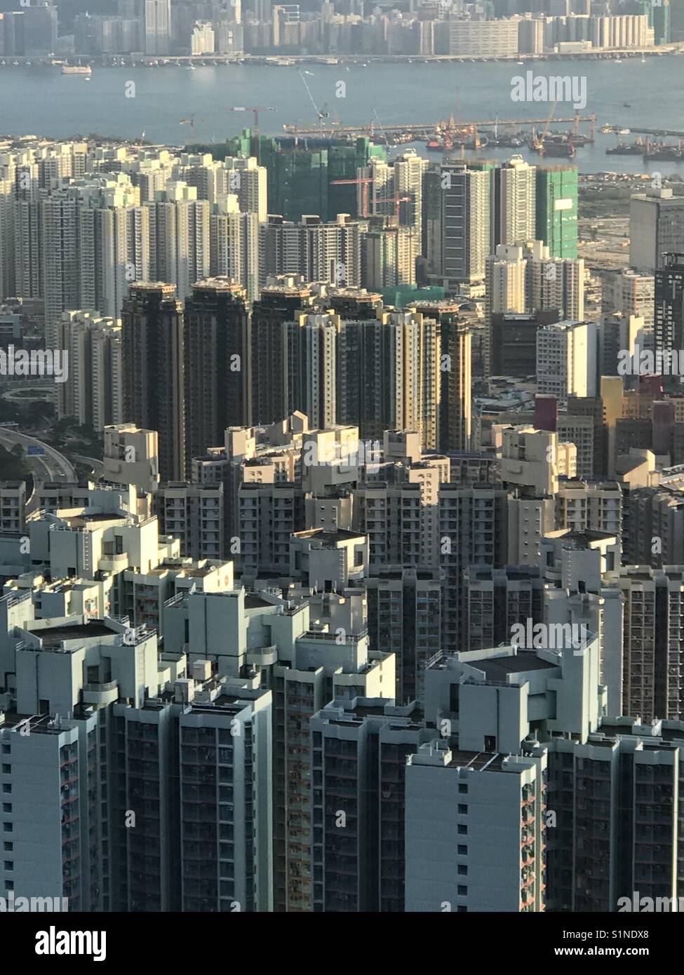 The city's of verticality shown in this picture of Hong Kong taken from Shatin's pass. Stock Photo
