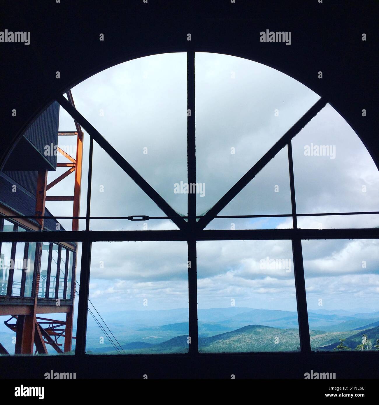 Looking out from a window in a structure near the summit, Cannon Mountain Aerial Tramway, Franconia Notch, White Mountains, New Hampshire - Smartphone Captured Stock Image