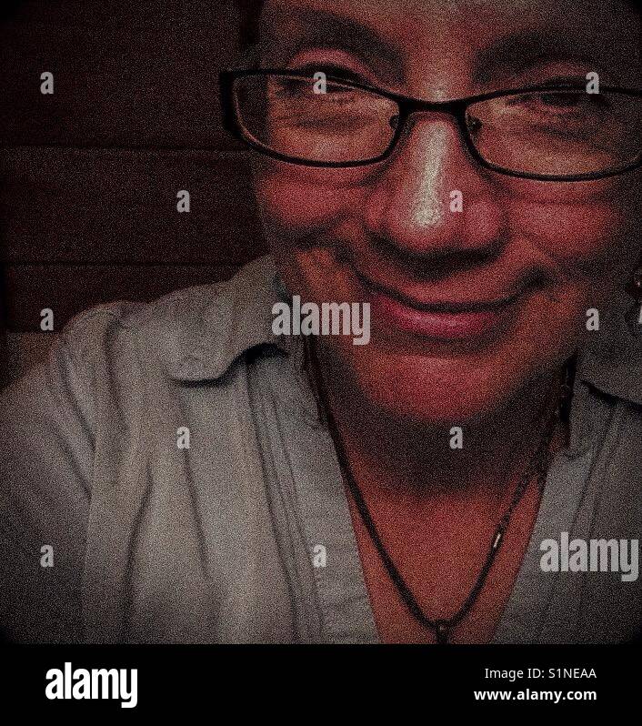 Happy mature woman - Smartphone Captured Stock Image
