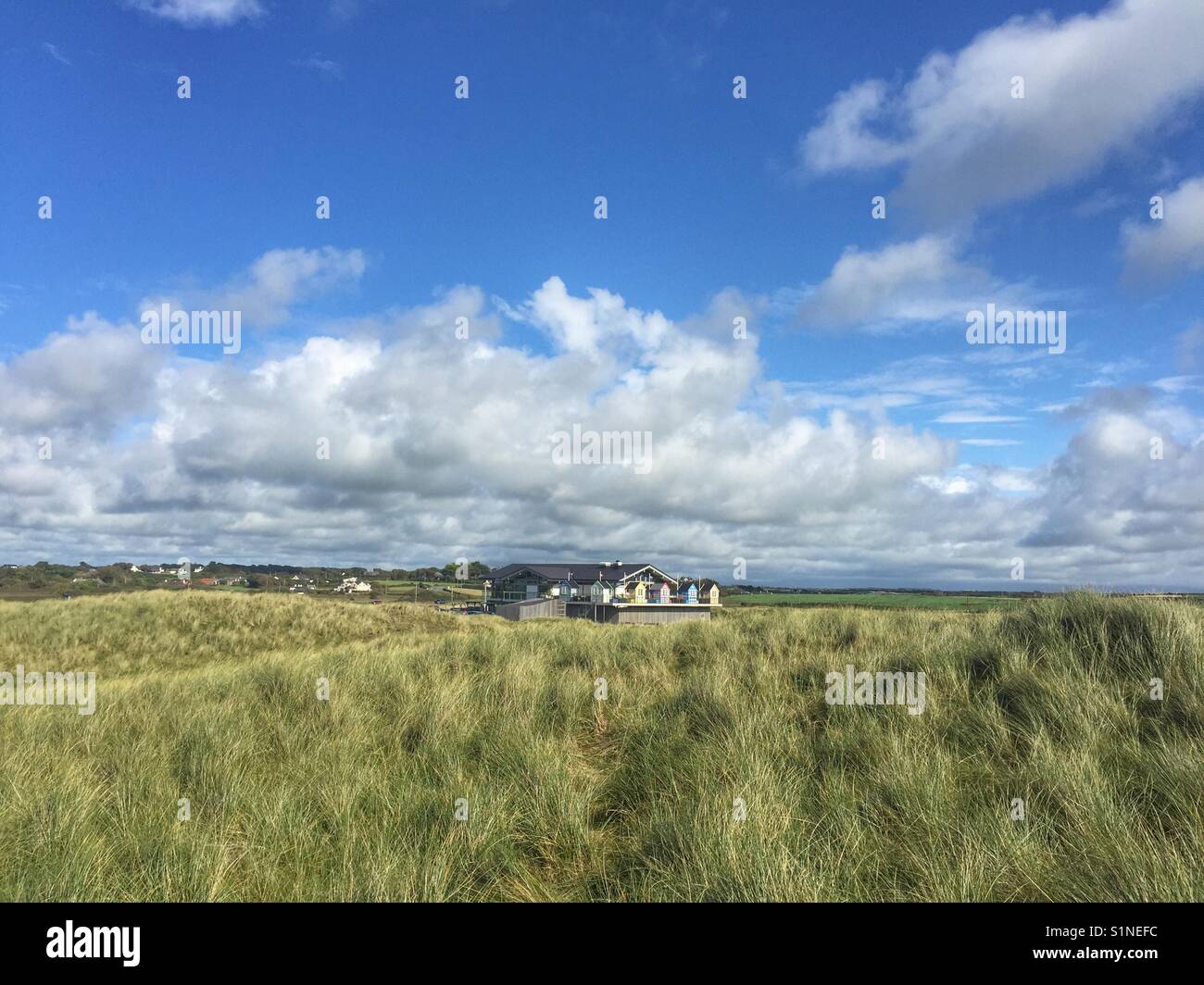 The Oyster Catcher pub, Rhosneigr, across the sand dunes Stock Photo