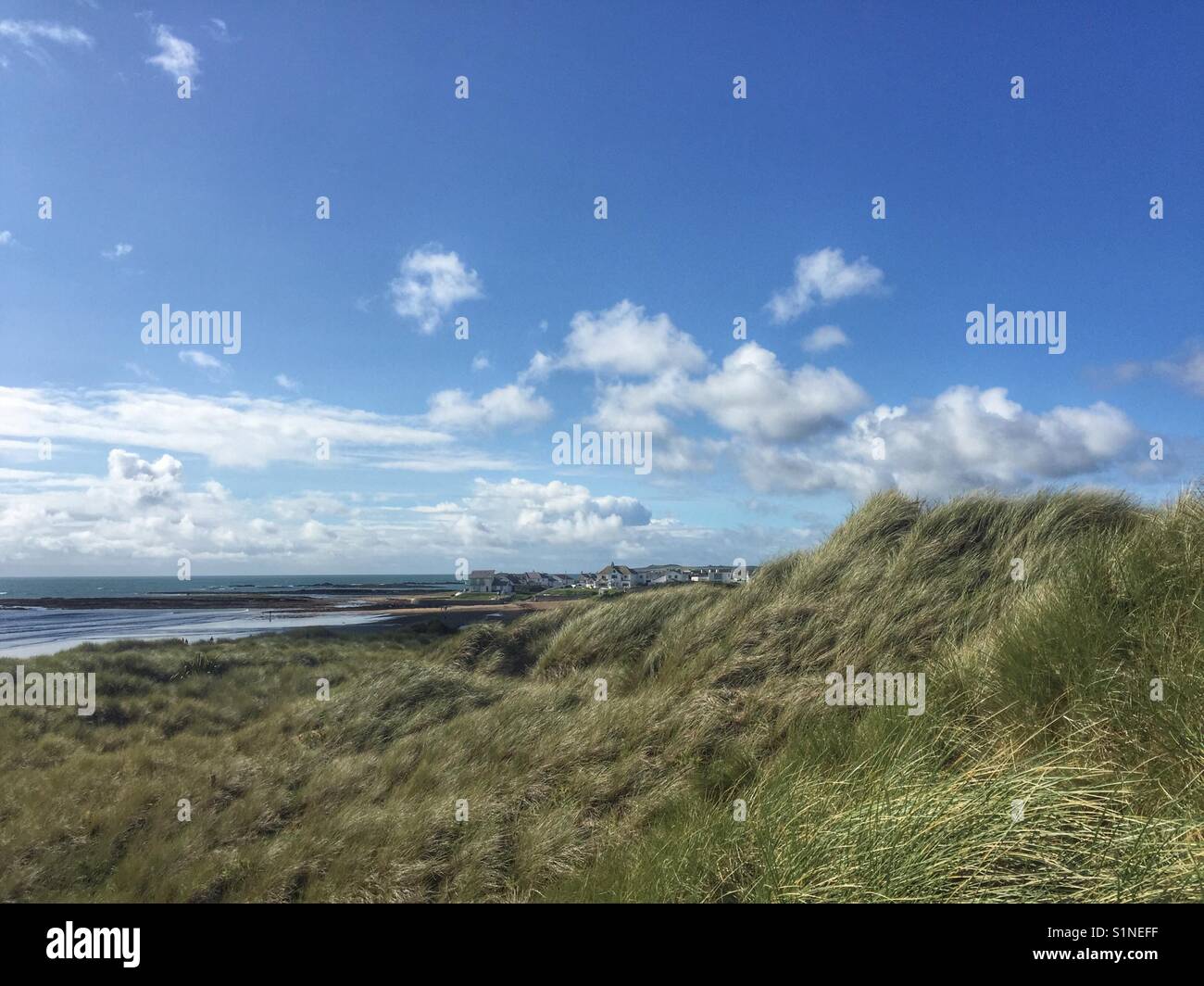 View from the sand dunes of Broad Beach looking towards Rhosneigr - Smartphone Captured Stock Image