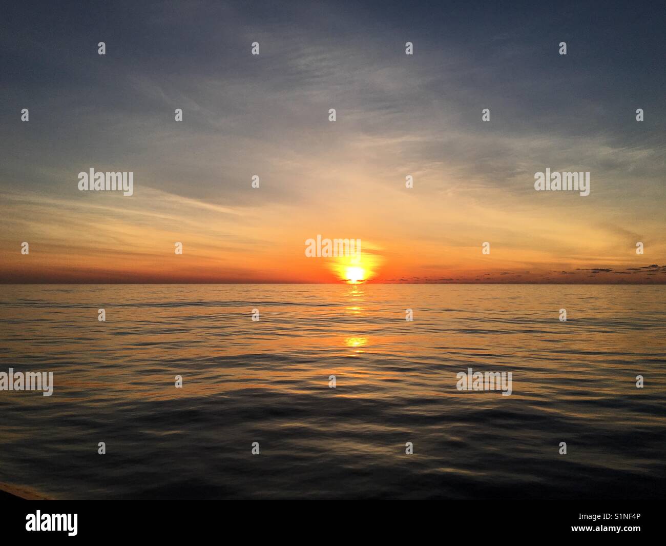 Sunrise over a very calm Atlantic Ocean - Smartphone Captured Stock Image