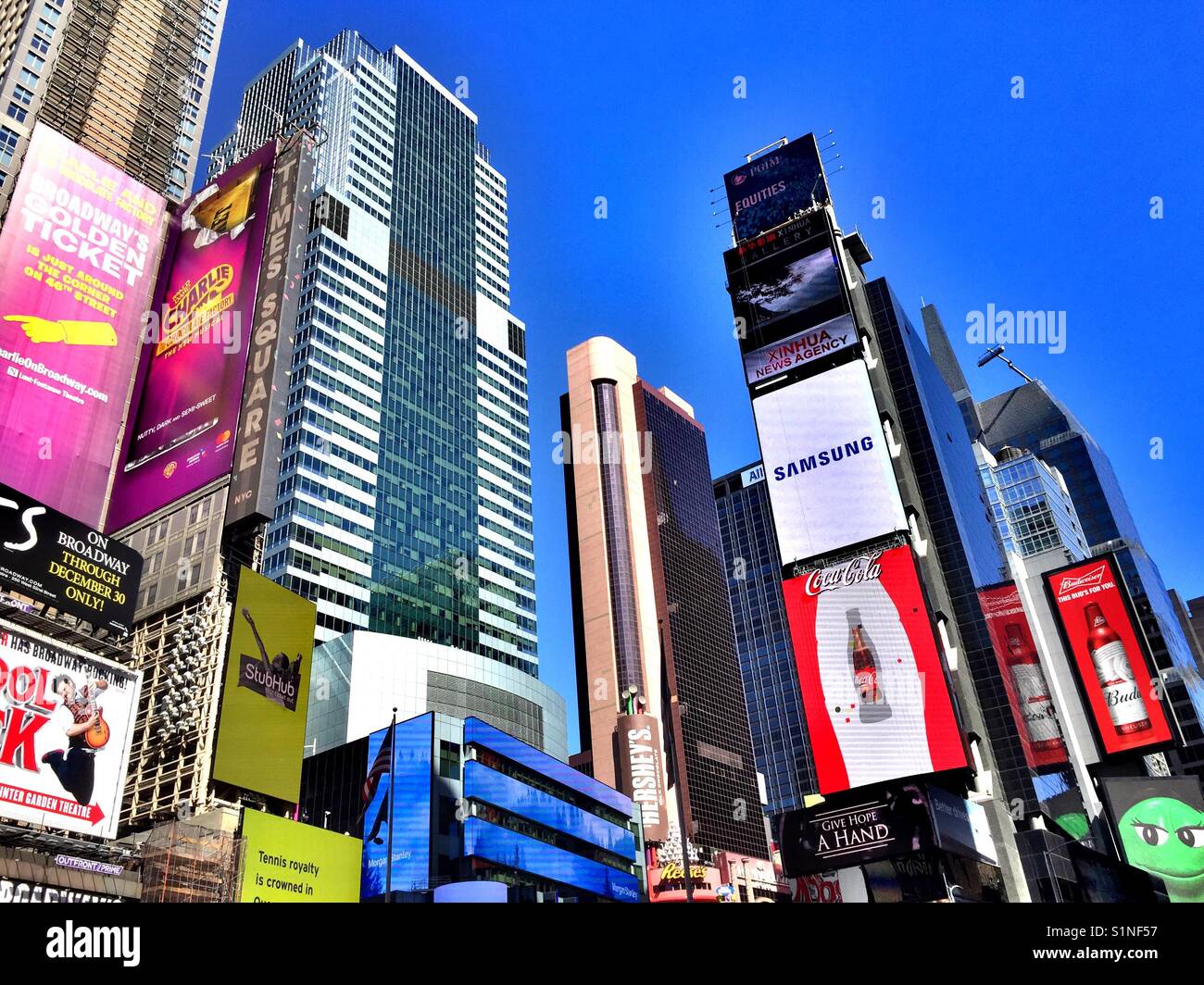 Skyscrapers covered in advertising billboards, Times Square, New York City USA - Smartphone Captured Stock Image