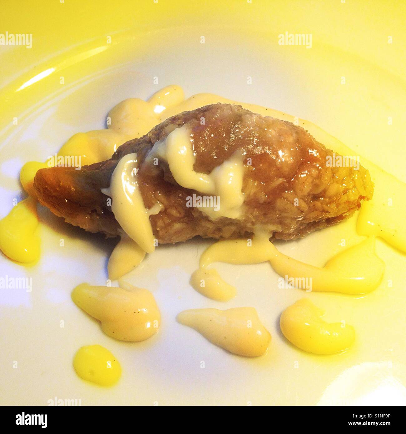 Food soggy cake and lumpy custard Stock Photo Alamy