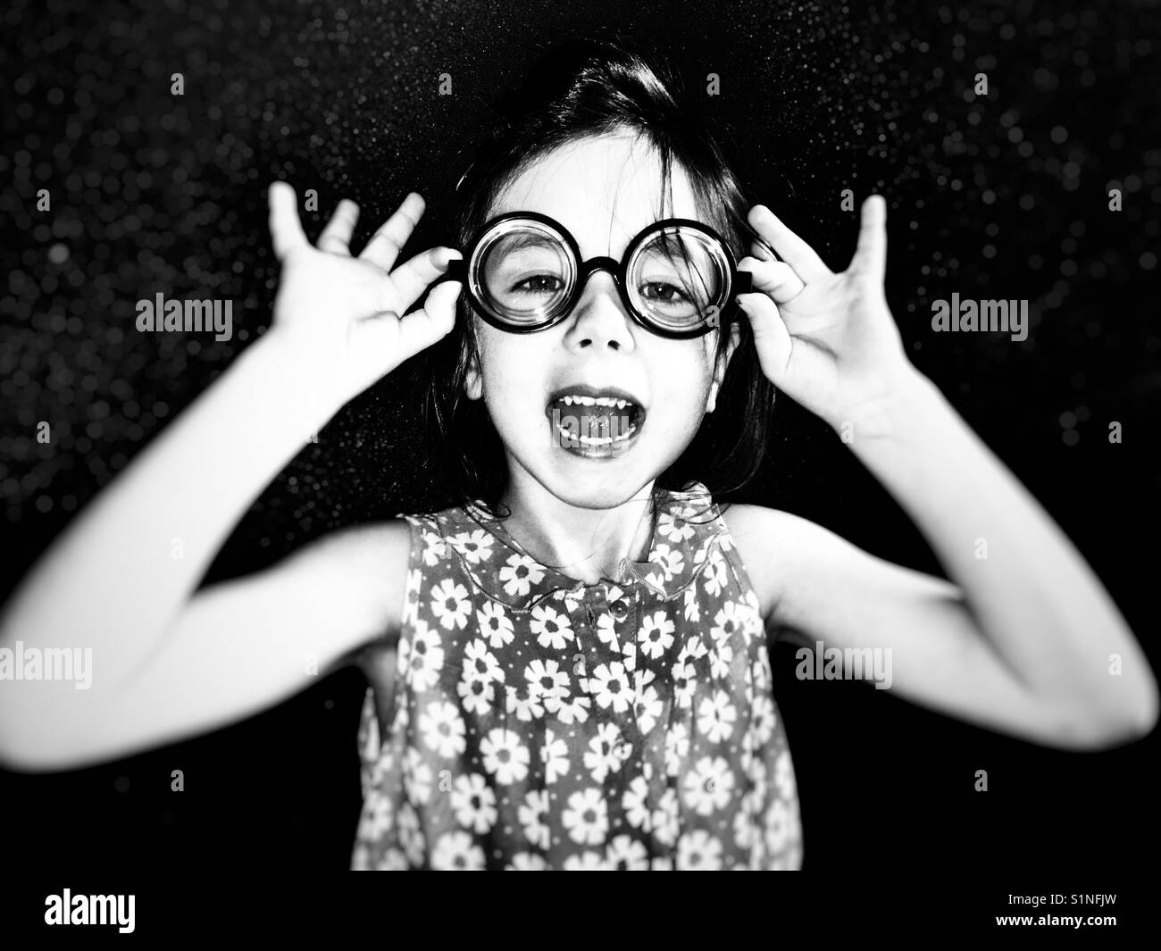 Child wearing a smile and comedy glasses Stock Photo