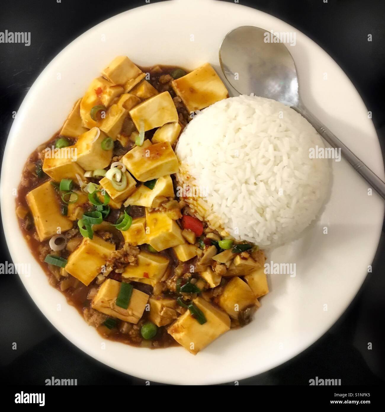 Cantonese Ma Po tofu with minced meat and rice Stock Photo Alamy