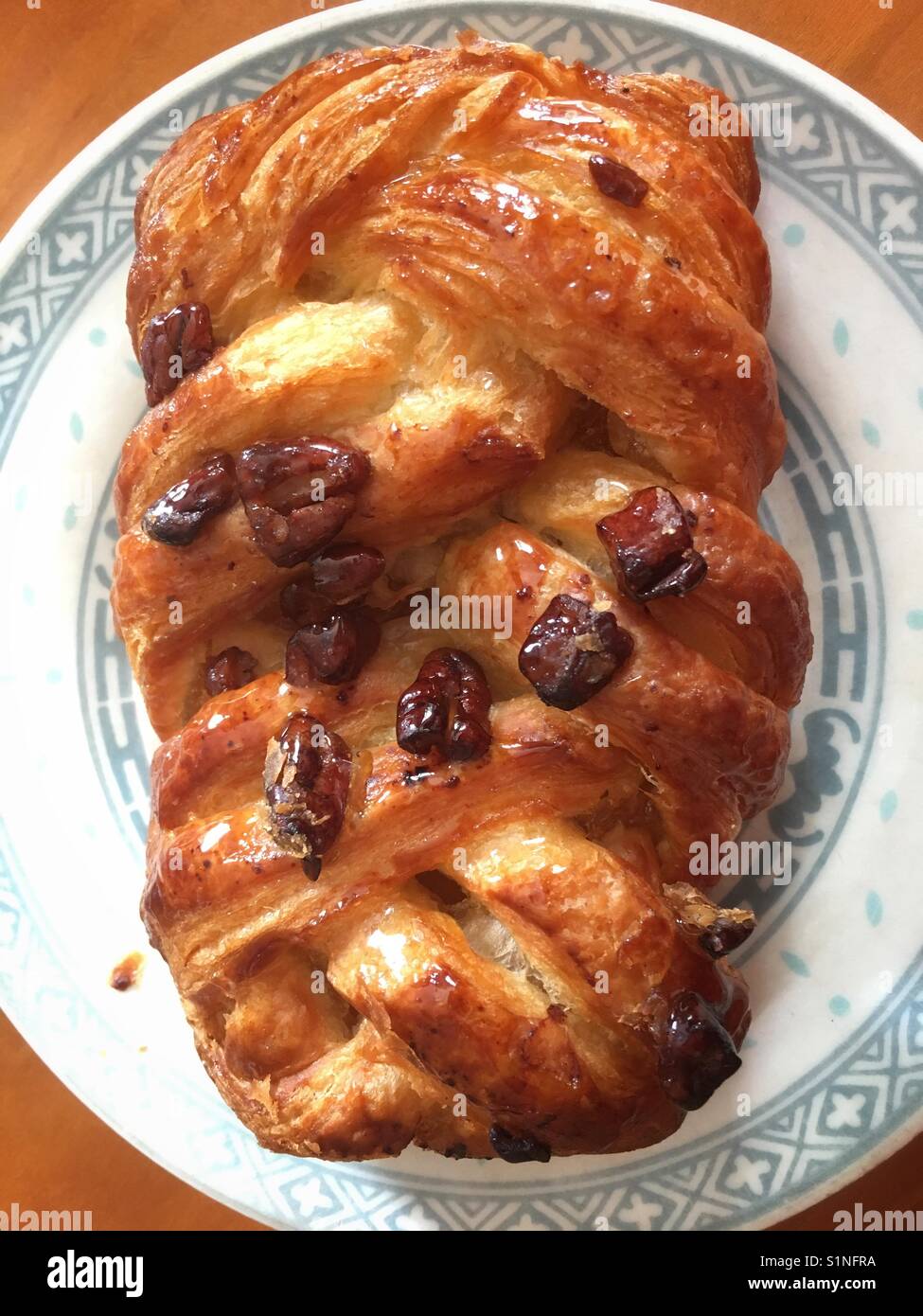 Pecan and maple syrup pastry on a plate - Smartphone Captured Stock Image