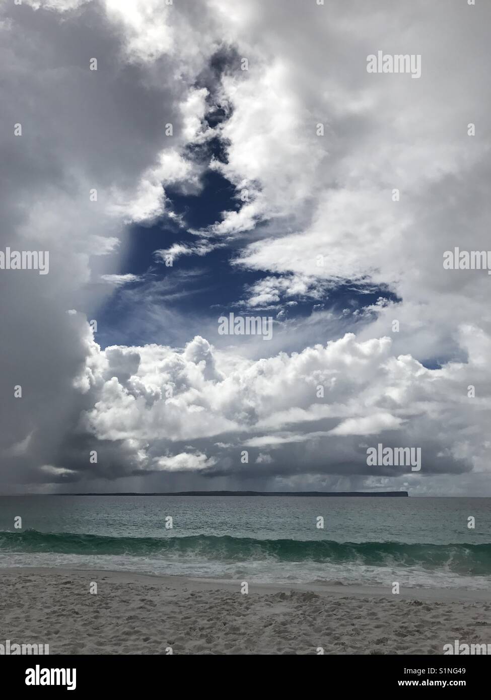 Stormy skies over Jervis Bay in New South Wales,  Australia. White sands, gray skies. Stock Photo