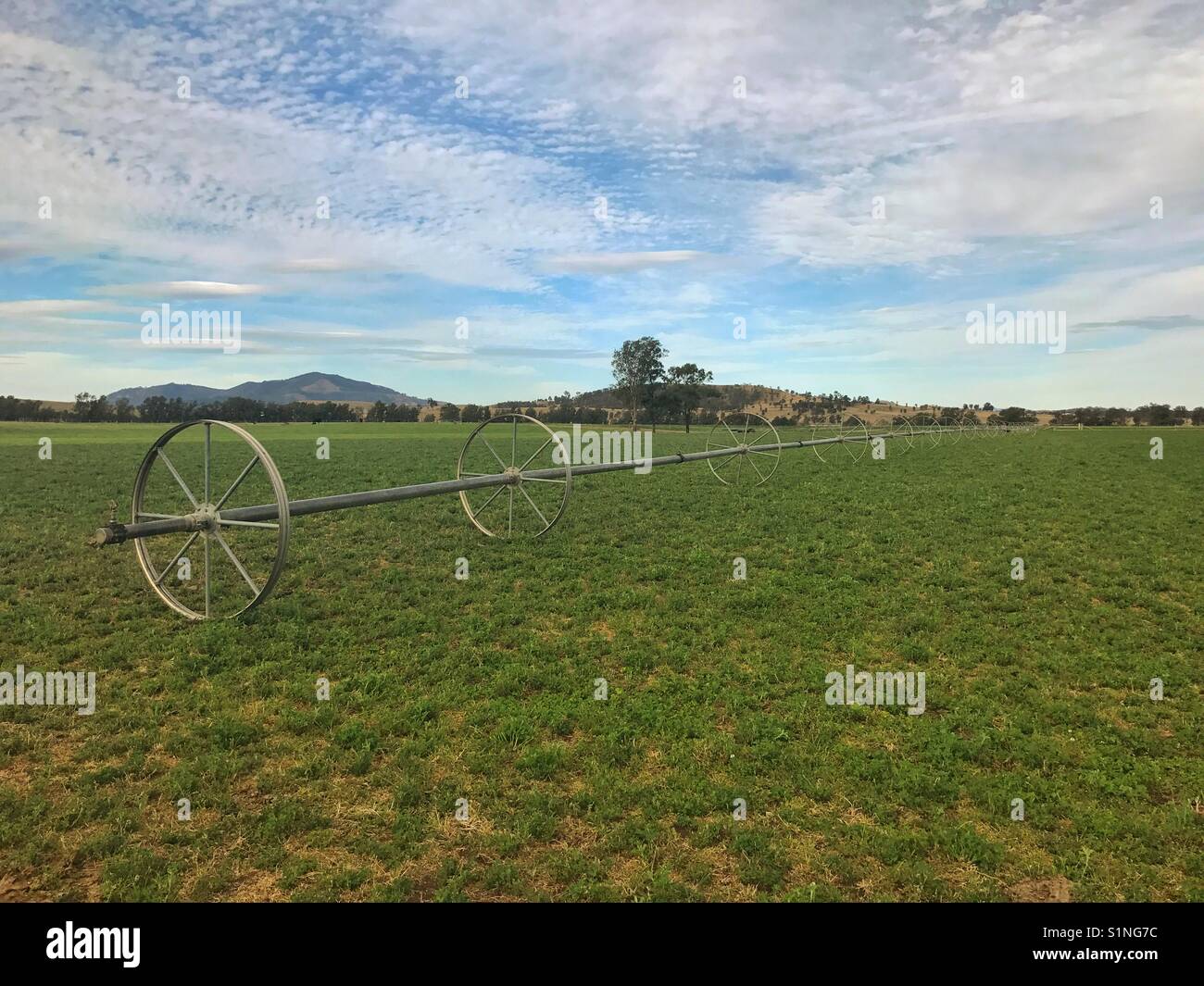 Travelling irrigator in paddock - Smartphone Captured Stock Image
