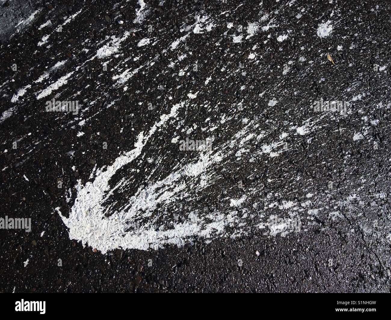 A stain of White paint on the tarmac Stock Photo