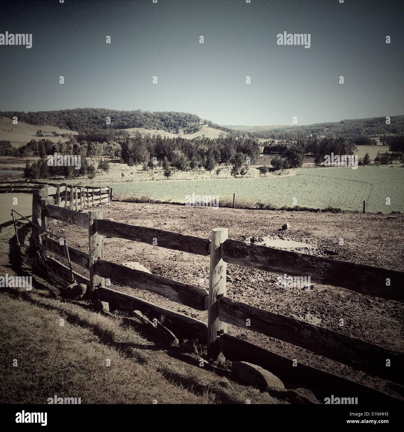 Timber fence around animal pen Stock Photo Alamy