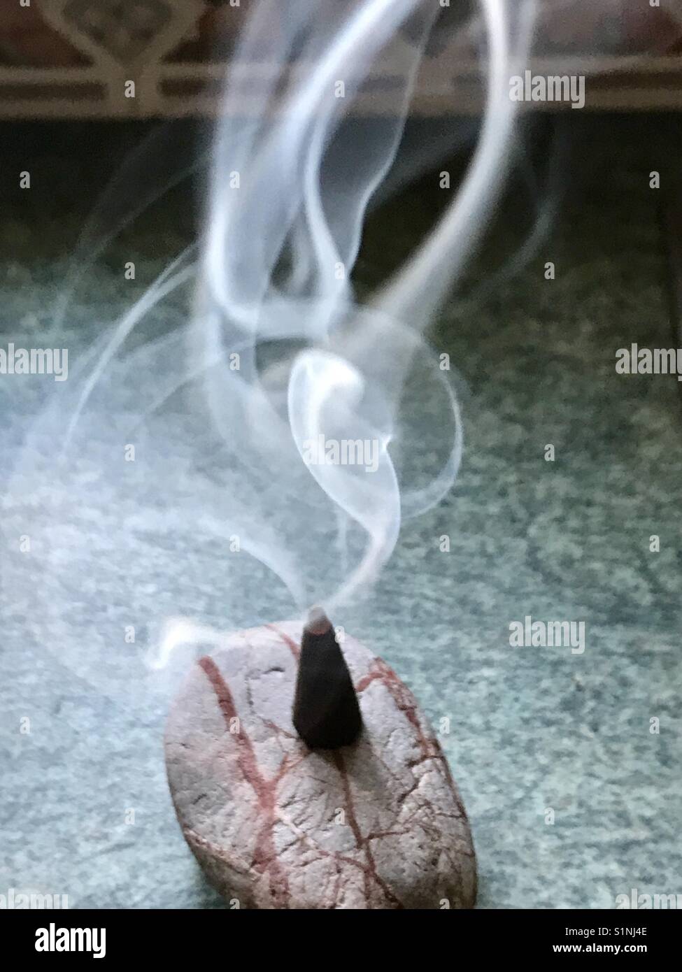 Smoke trail from frankincense - Smartphone Captured Stock Image