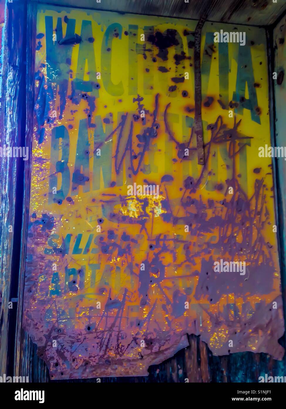 Old rusted Wachovia Bank &Trust metal sign - Smartphone Captured Stock Image