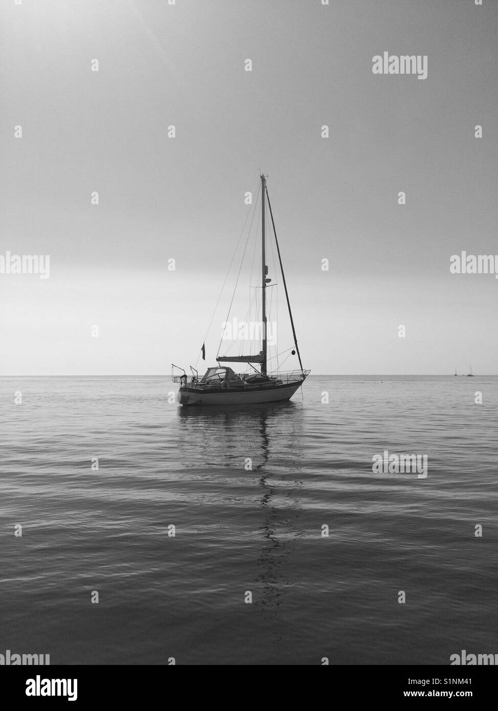 Sailing boat moored at sea Stock Photo