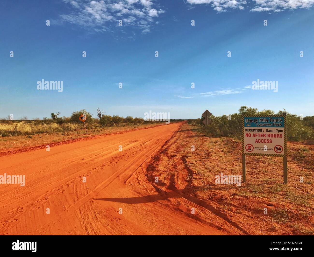 Red dirt road to beach Stock Photo Alamy