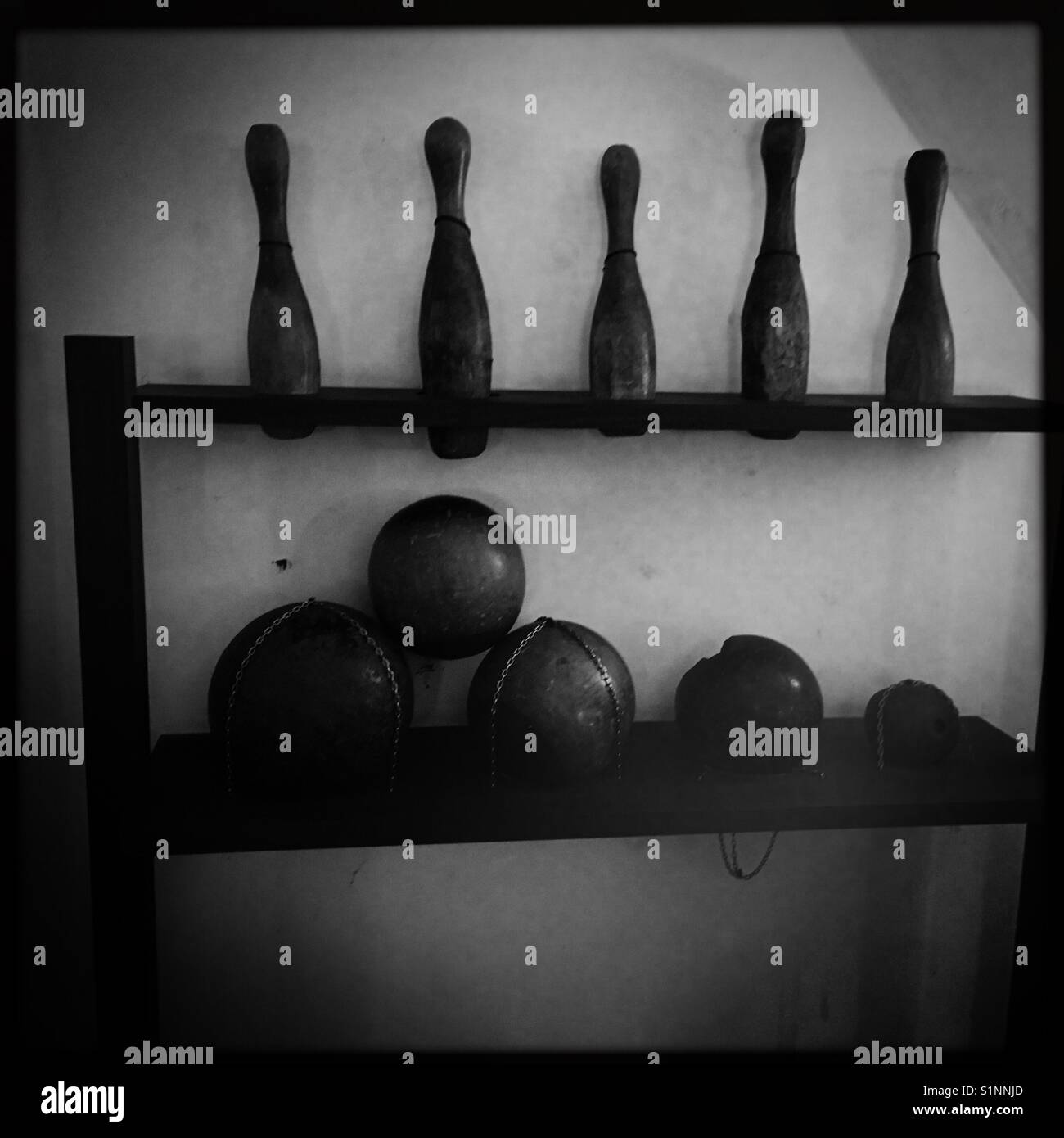 Old skittles and cannon bowling balls - Smartphone Captured Stock Image