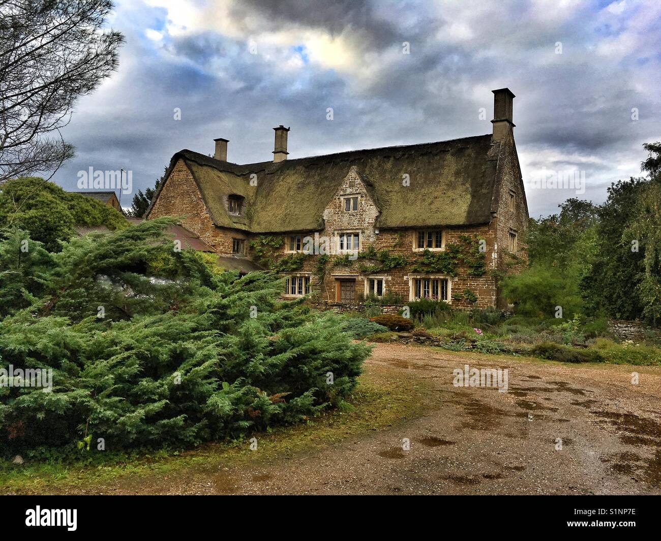 Thatched roof house in Chacombe Northamptonshire - Smartphone Captured Stock Image