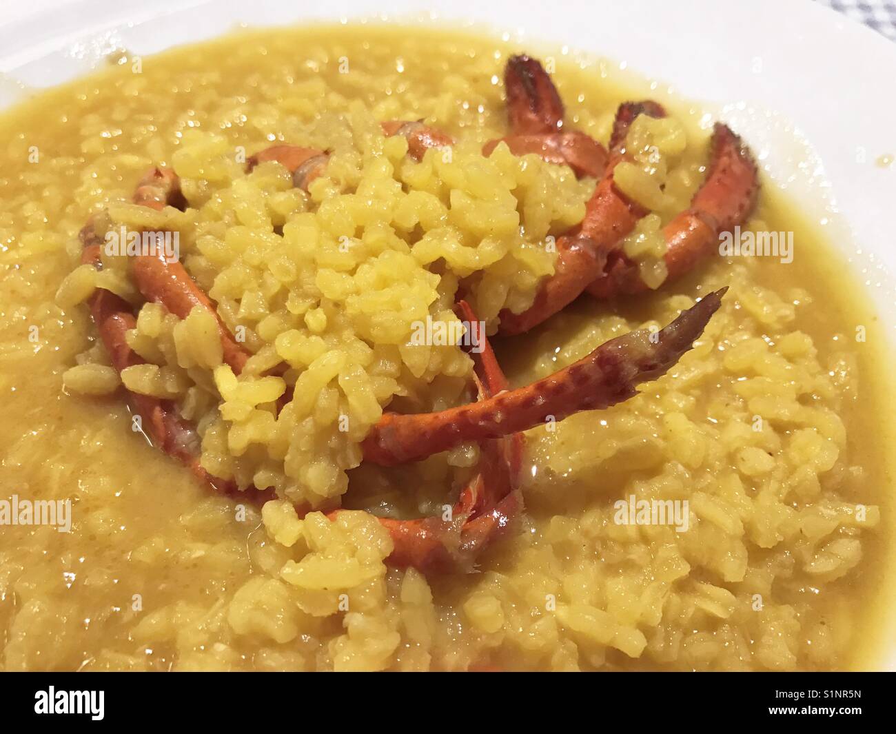 Lobster Stock Rice Rice with lobster serving. Close view Stock Photo - Alamy