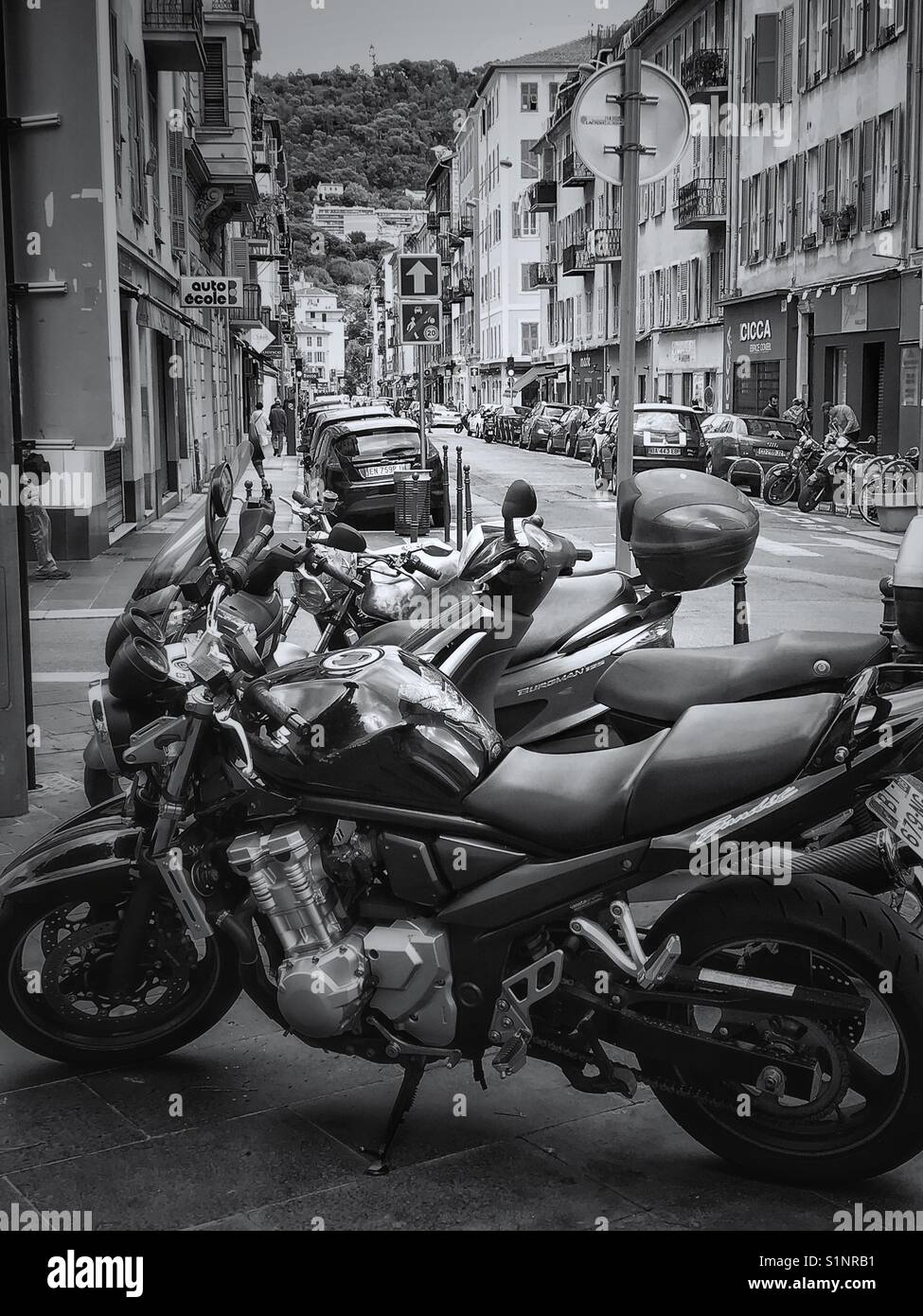 Motorcycles parked on a street in Nice, France. Stock Photo