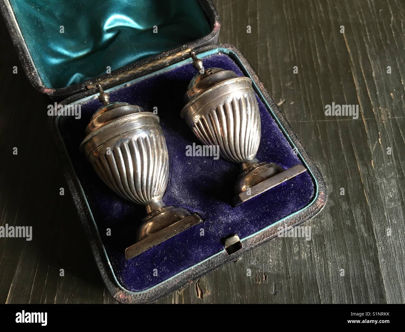 A pair of antique English Solid Silver Salt and pepper shakers in