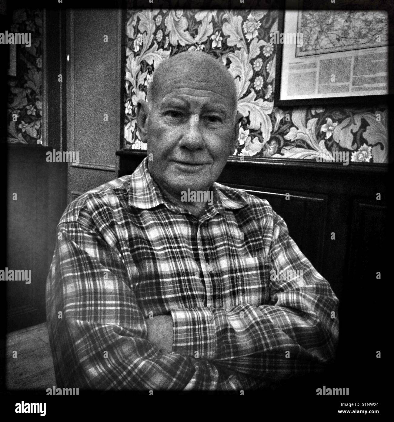 Elderly man in pub Stock Photo