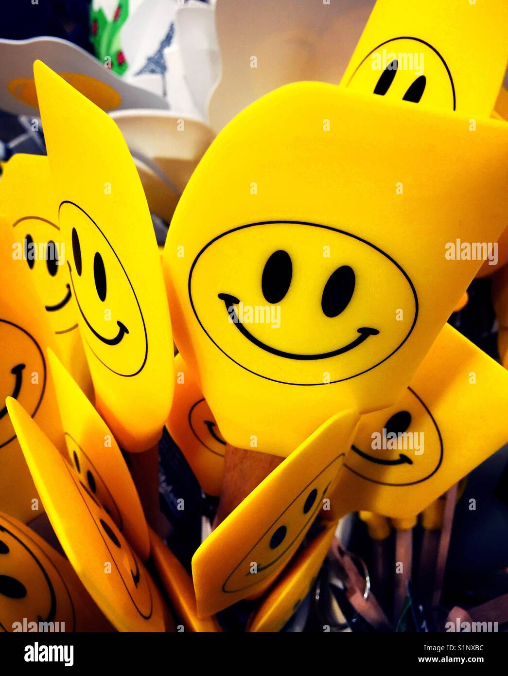 Spatulas with happy face, USA - Smartphone Captured Stock Image