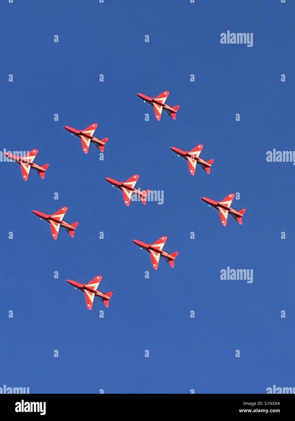 9 Red Arrows in formation during an air display - Smartphone Captured Stock Image