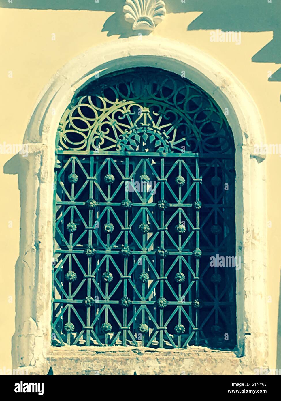 Window on the Chiurch of Theotokos Koimisis in Kaligata on Kefalonia in Greece - Smartphone Captured Stock Image