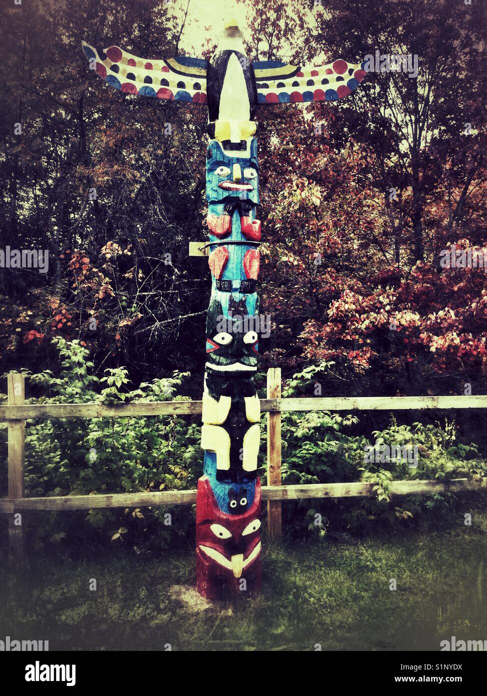 A totem pole. - Smartphone Captured Stock Image