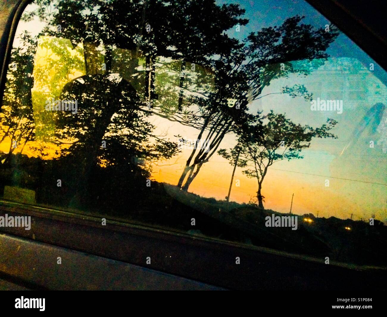 Sundown in the window of a pickup - Smartphone Captured Stock Image