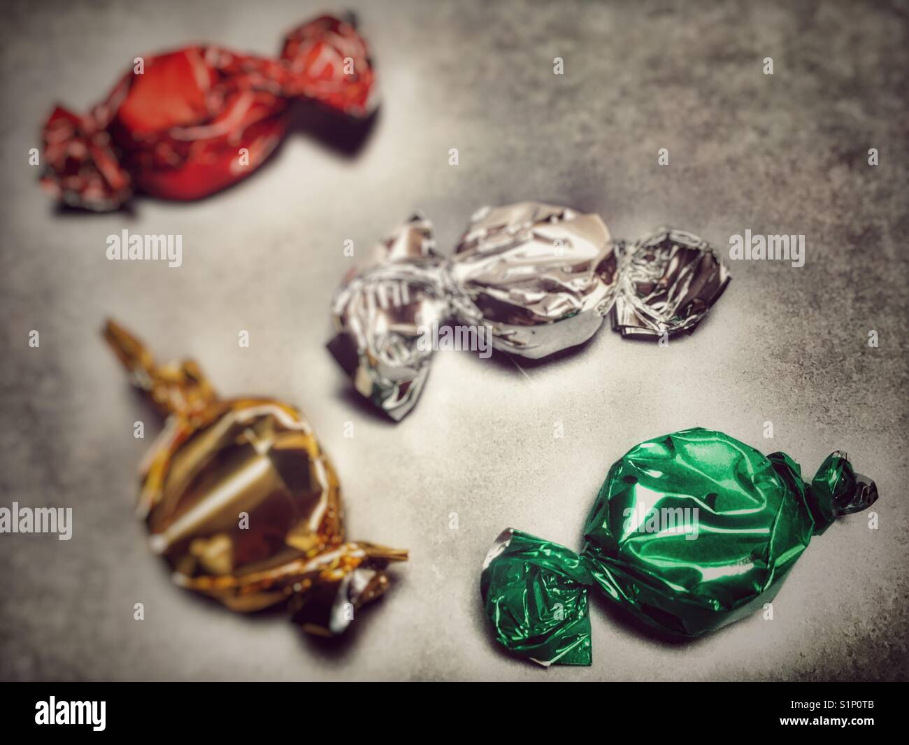 Sweets in wrappers hi-res stock photography and images - Alamy