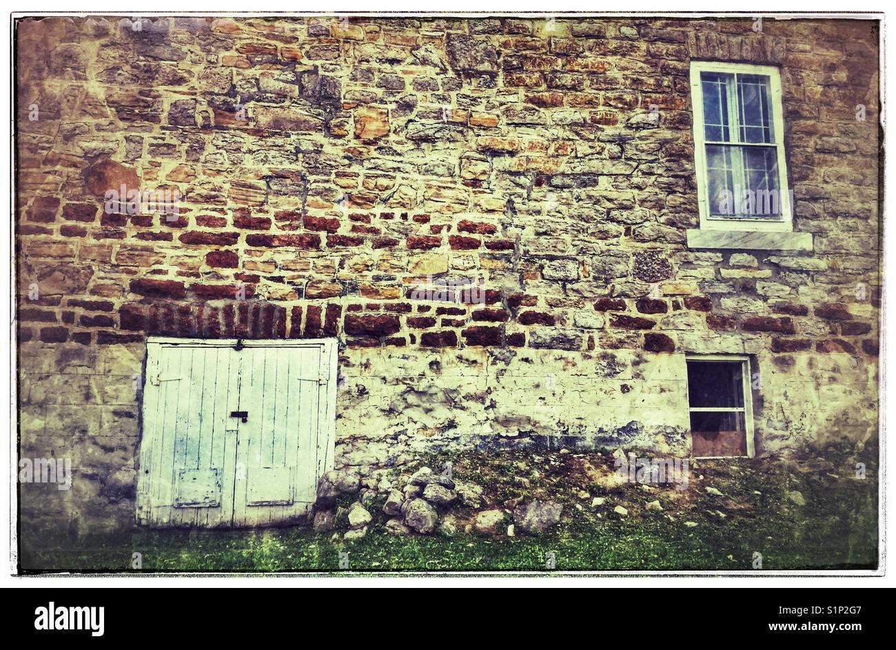 The side of an historic stone building. - Smartphone Captured Stock Image