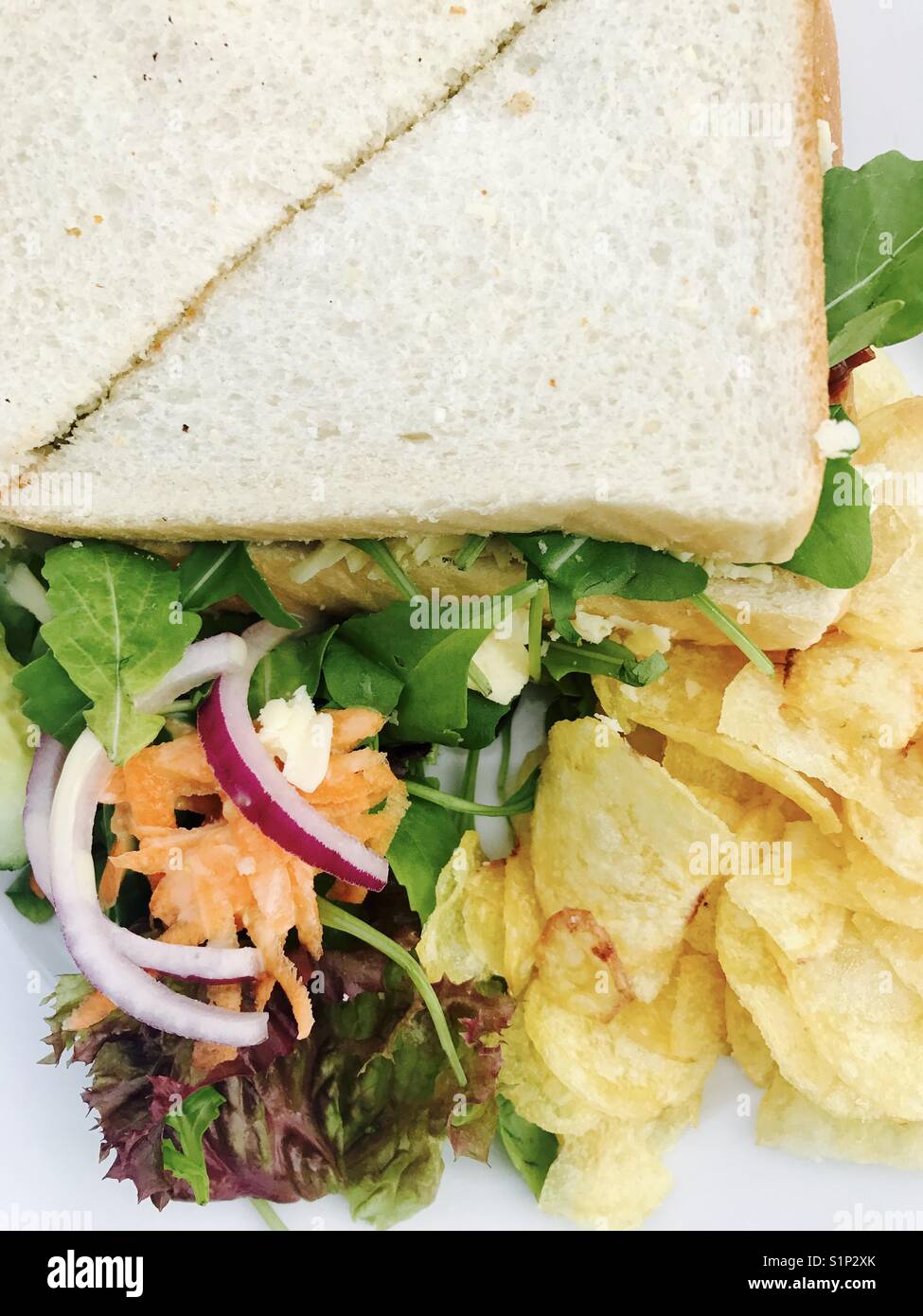 Cheese and salad sandwich with crisps Stock Photo Alamy
