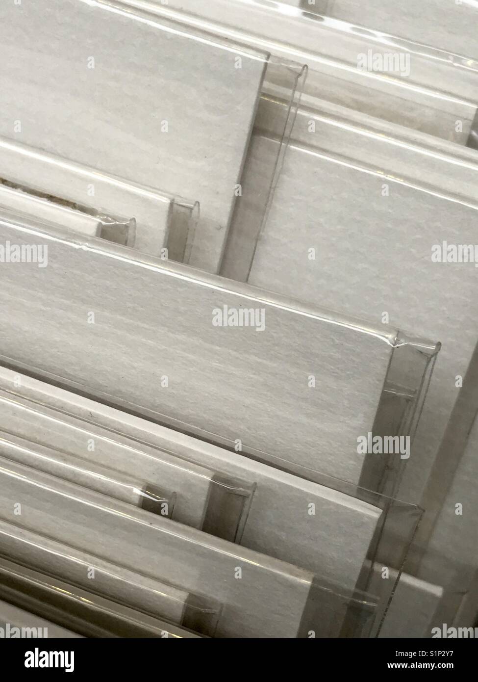 Upright display of white matted prints - Smartphone Captured Stock Image