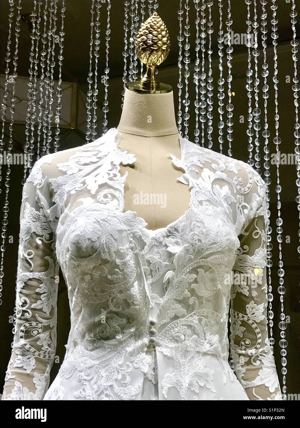 Wedding dress in a shop window. - Smartphone Captured Stock Image
