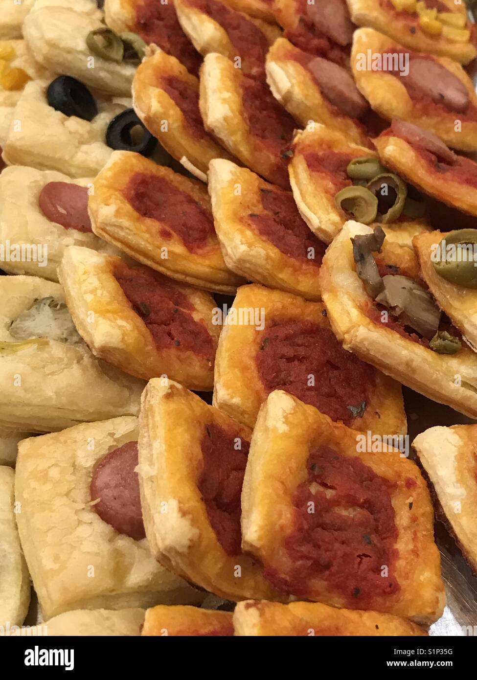 Many pieces of pizza at the bar - Smartphone Captured Stock Image